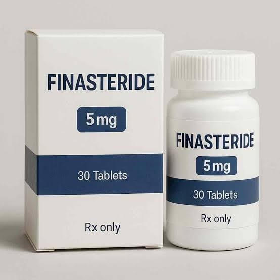 A box and bottle of finasteride tablets